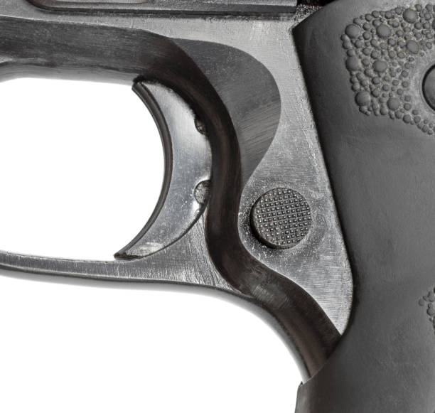 Magazine release and trigger on a semi-auto handgun