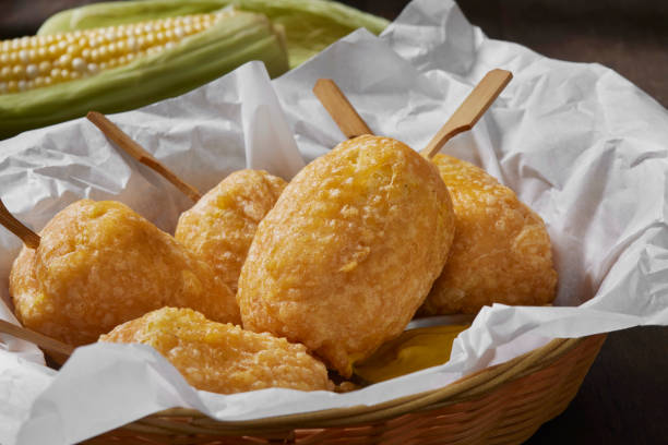 Beer Battered Corn on the Corn Beer Battered Corn on the Corn with Spicy Mustard Dip corn cob eaten stock pictures, royalty-free photos & images