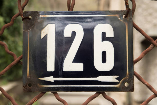 istock Weathered enameled plate number 126 1483296393