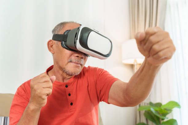 istock Asian Senior Adult Man is using VR glasses 1483298276