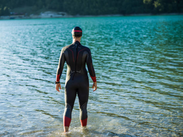 istock A triathlon swimmer preparing for a river training to gear up for a marathon 1483299857