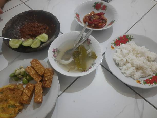 istock a simple meal with a few side dishes and white rice which is common in Indonesia 1483302986