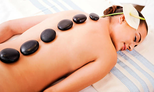 istock Beautiful Woman with Massage Stones 148330348