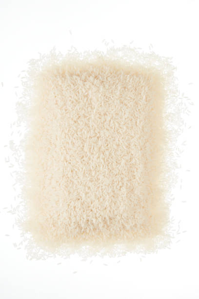istock Top View of Raw Rice On White 1483304192