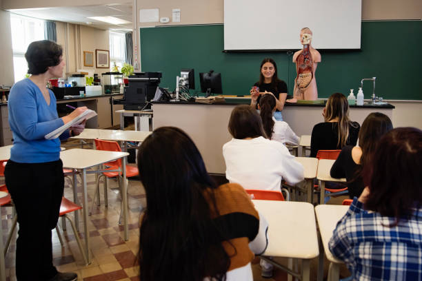 Girls in STEM, student of biology class doing a presentation.