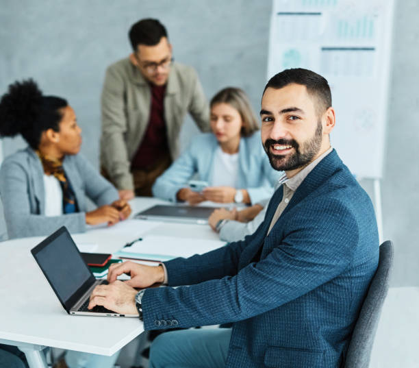 istock young business people meeting office teamwork group whiteboard presentation seminar man businesswoman startup creative training portrait 1483306619