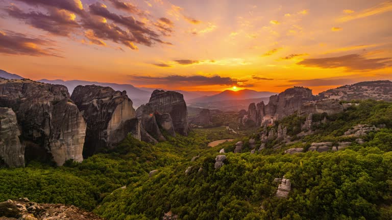 TIME LAPSE shot of landscape with Meteora rock formations and trees. Monasteries and Rock Formations in Meteora, Greece