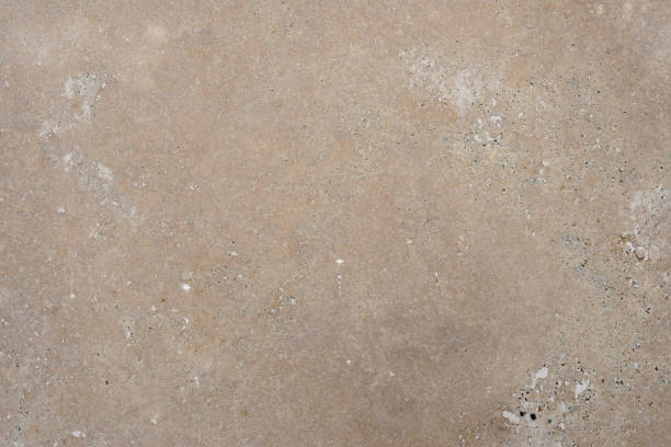 Beige stone background or metal surface texture, concrete wall