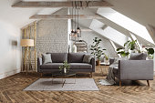 Modern Living Room Interior With Sofa, Armchair, Coffee Table And Houseplants In The Attic.