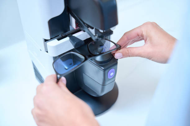 istock Qualified optician is making optician glasses in the modern clinic 1483314307