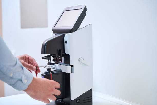 istock Person is making ophthalmology glasses on the modern optician machine 1483314312