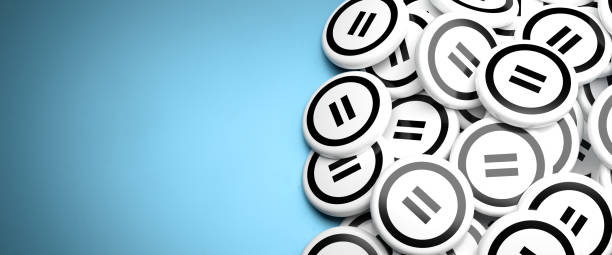 Logos for the creative commons license called ND (no derivative works) of the creative commons organisation on a heap on a table. Web banner format with copy space