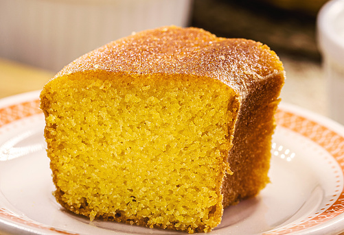 slice of cornmeal cake, traditional homemade corn cake from Brazil in June parties, traditional food for June and July festivals