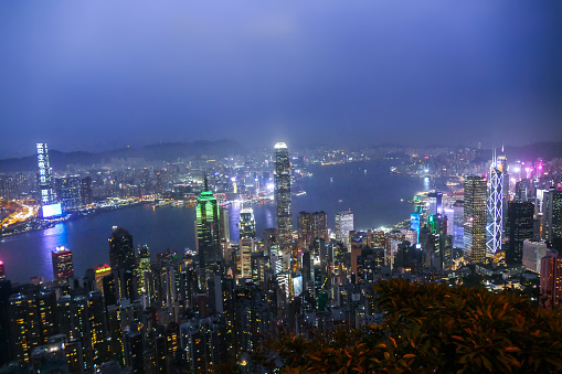 Hong Kong skyline at night view from Victoria Peak, The promenade commands a panoramic view across Victoria Harbour. With an elevation of 552 m and the tallest hill on city