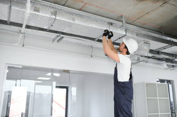 istock ventilation system installation and repair service. hvac technician at work. banner copy space 1483324917