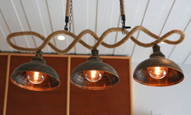 istock Decorative antique light bulbs against in the Cafe. 1483325168