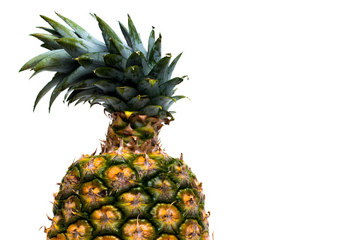 High key photograph of a ripe pineapple for professional design elements - Stock photo