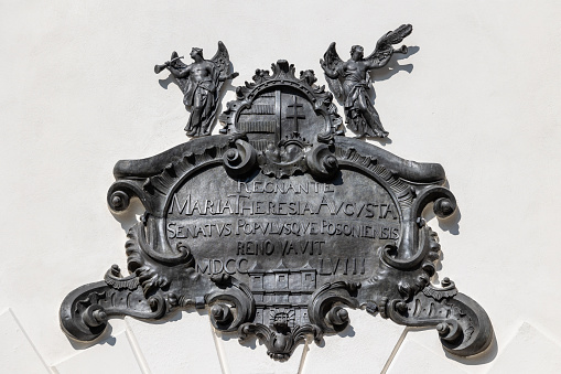 18th century black iron plaque on St Michael's gate in Bratislava with dedication to Empress Maria Theresa