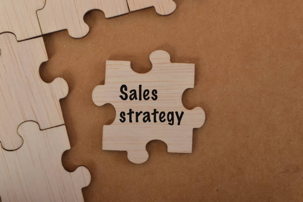 istock the word SALES STRATEGY is written on jigsaw puzzle. 1483328940