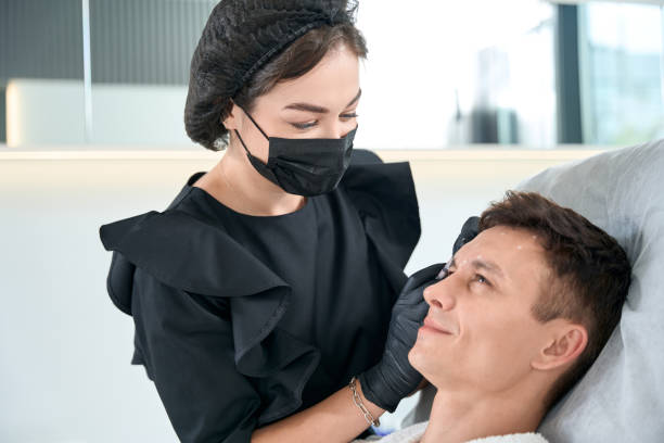 istock Patient in beauty clinic getting injection procedures 1483330696