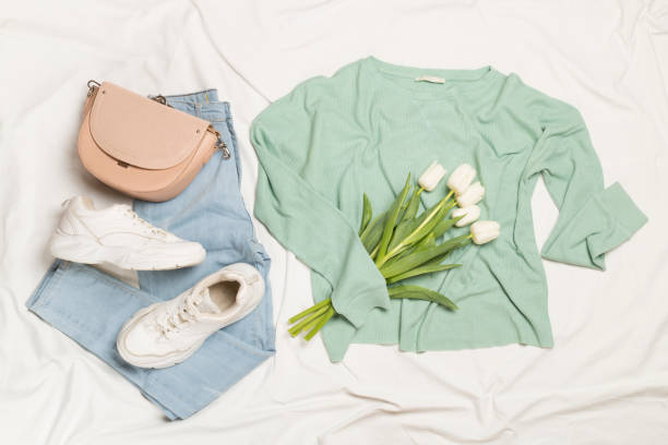istock Stylish pastel spring outfit on white sheet background, top view 1483331581