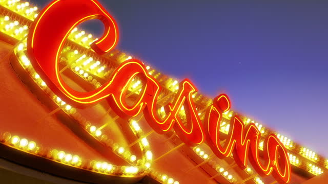 Flashing Neon Casino Sign at Night