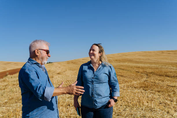 istock Farmers talking in the oat field 1483333726
