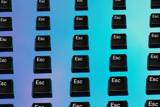 Seamless pattern of ESC buttons on a gradient purple and blue  holographic background. Seamless pattern of ESC buttons on a gradient purple and blue  holographic background. escape key escape computer push button stock pictures, royalty-free photos & images