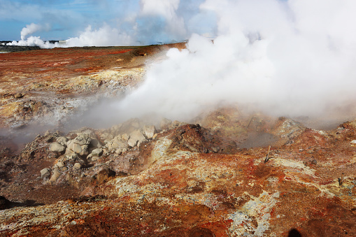 Steam from the geothermal field at Gunnuhver, in the Reykjanes Peninsula of Iceland, with fumaroles releasing gases and boiling water from volcanic activity