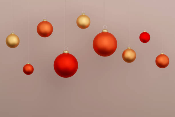 istock Multiple red and gold Christmas balls, shiny ornaments on light grey, 3d rendering. concept for happy new year 1483337259
