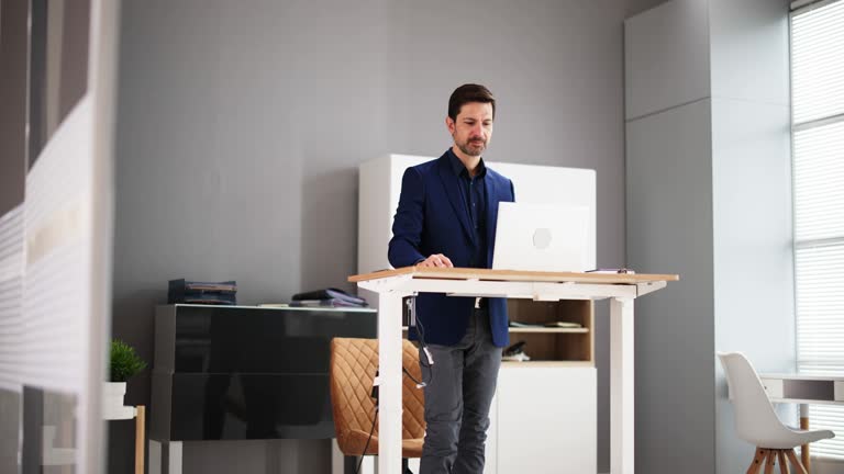 Adjustable Height Desk Stand In Office