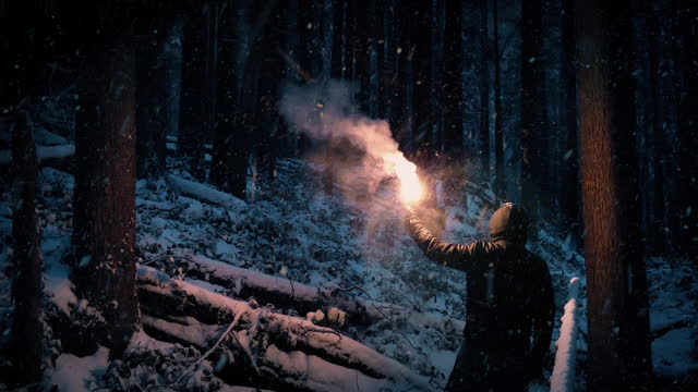 Man Lights Flare In Snowy Wilderness And Walks Off
