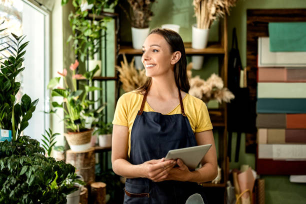 istock Owner at her flowers shop 1483352179