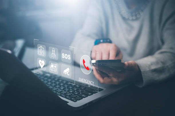 istock Man hand hold smartphone SOS Emergency app in home, call phone, Chat message icon, Emergency application from smartphone for elderly, technology concept.Old hand touch mobile phone and call for help. 1483354633