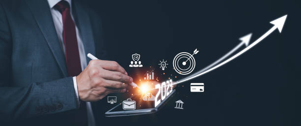 istock 2023 and Startup concept with icon business and network connection on modern virtual interface from digital tablet.Businessman Touching tablet and graph Screen Icon of media screen, Technology Process 1483355793