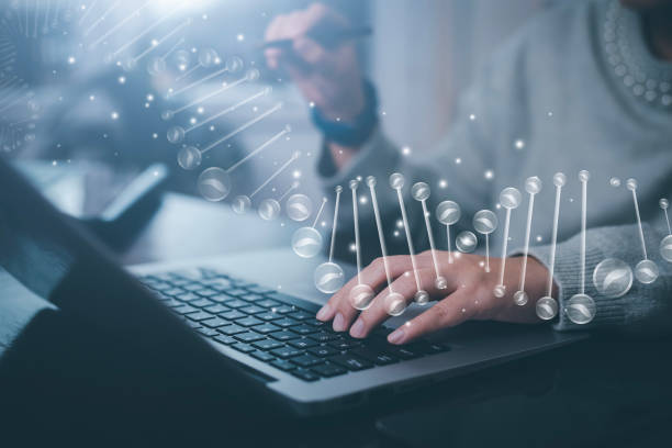 istock Businessman using a laptop and Touch DNA 3D graph and biochemical research scientist working with a microscope, human DNA detection graph, Checking for abnormalities in the body,science and experiment 1483356917