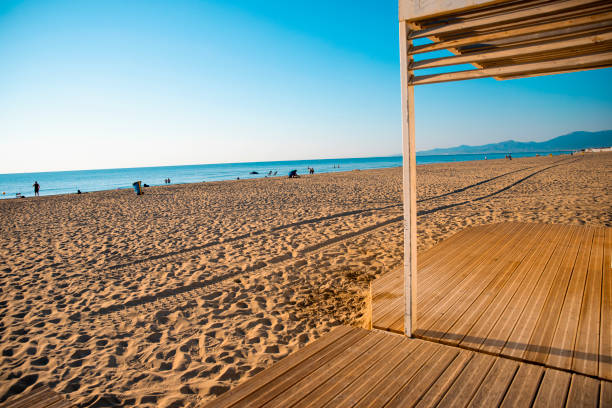 istock Sand beach and wooden shade 1483359189