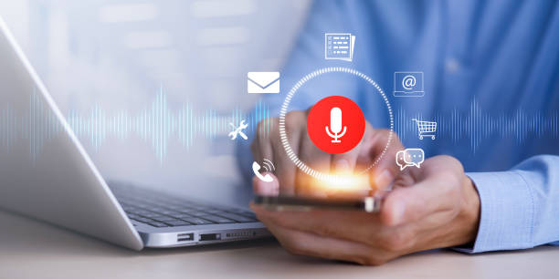 istock Businessman using smartphone touch microphone button on virtual screen. Blog blog speak talk advertising presentation,Voice recognition, speech detection and deep learning application,Voice Assistance 1483359285