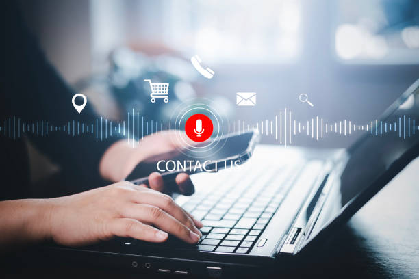 istock Businessman using smartphone touch microphone button on virtual screen. Blog blog speak talk advertising presentation,Voice recognition, speech detection and deep learning application,Voice Assistance 1483359447