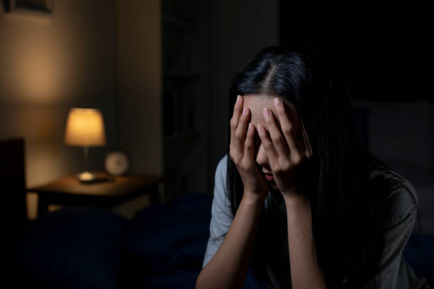 istock Depressed young Asian woman can not sleep from insomnia 1483361655