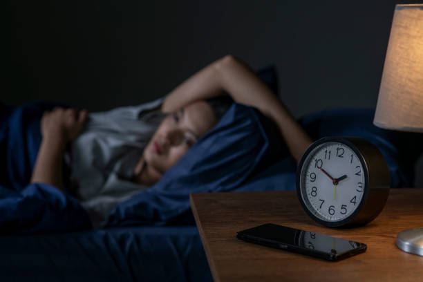 istock Depressed young Asian woman can not sleep from insomnia 1483361737