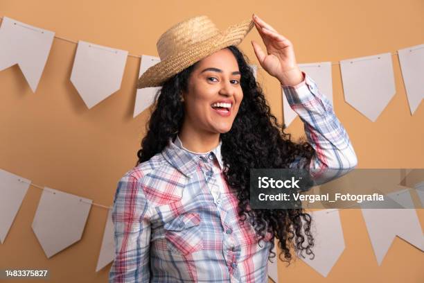Happy Brazilian Woman To Festa Junina In Brazil In Beige Background Smiling And Looking At Camera Stock Photo - Download Image Now