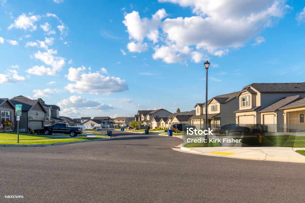 A typical American subdivision of new homes in a planned community, in the suburban area of Spokane, Washington, USA. Residential District Stock Photo