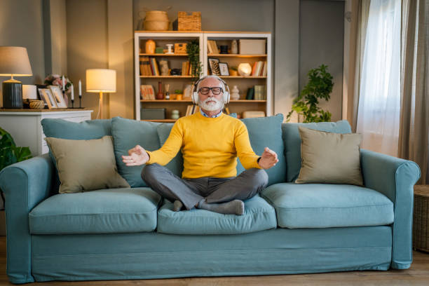 istock Mature senior man practice guided meditation manifestation at home 1483381643