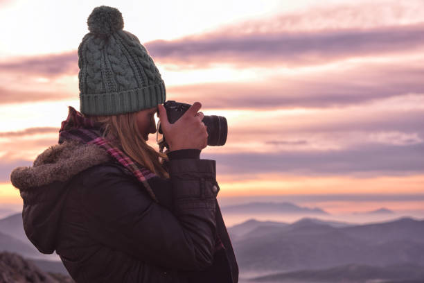 istock Beautiful young female photographer 1483387433