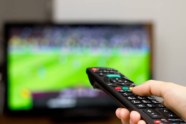 istock Watching soccer game on TV 148338875