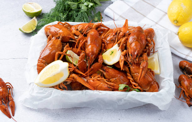 istock top view of cooked crawfish platter with lemons and spices 1483389990