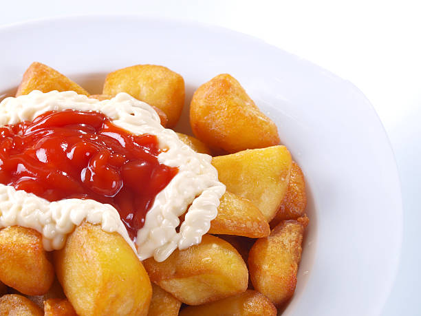 istock Patatas Bravas – Hot spicy fried potatoes 148339042