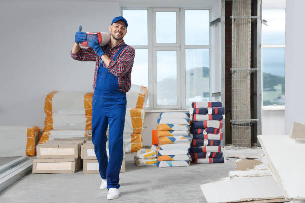 istock Construction worker with new building materials in room prepared for renovation 1483392399