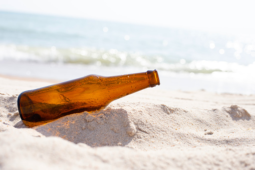 Glass bottle on the beach